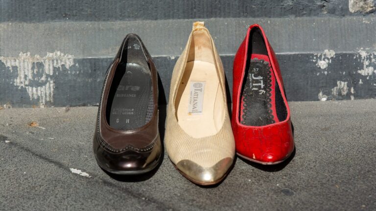 A collection of vintage high-heeled shoes on display