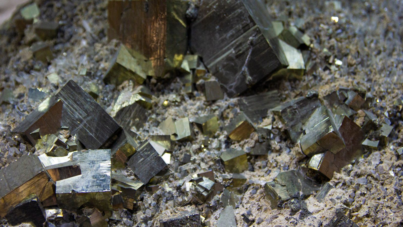 Close-up of gold-toned pyrite mineral formations