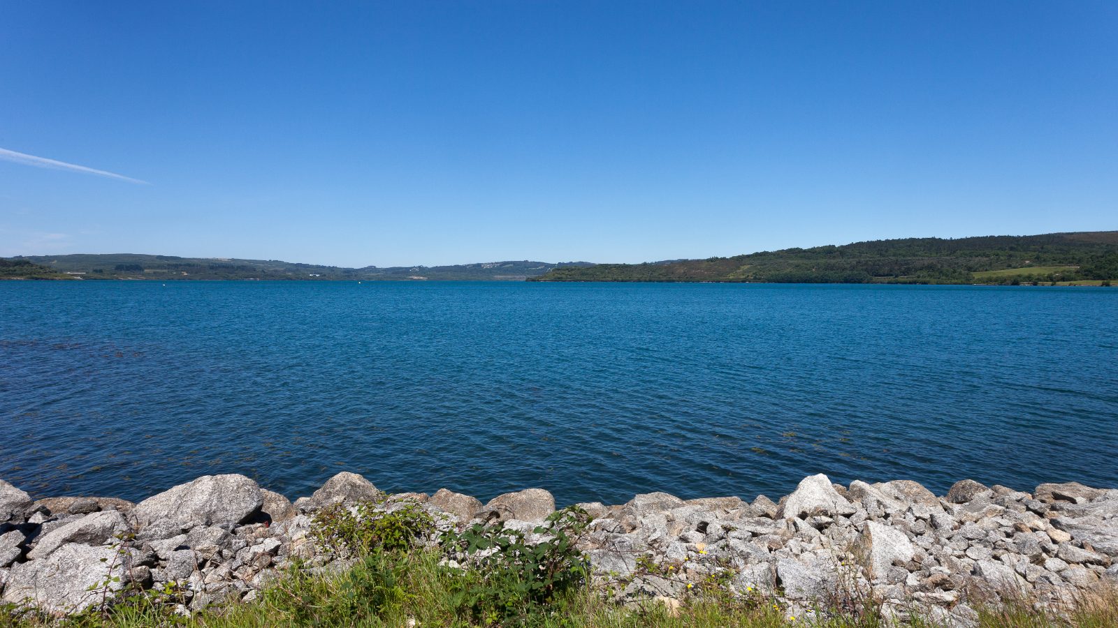 A 950-Foot-Deep Former Coal Mine in Spain Is Now a Lake People Swim In